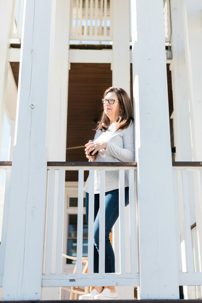 woman on porch at Carlton Landing